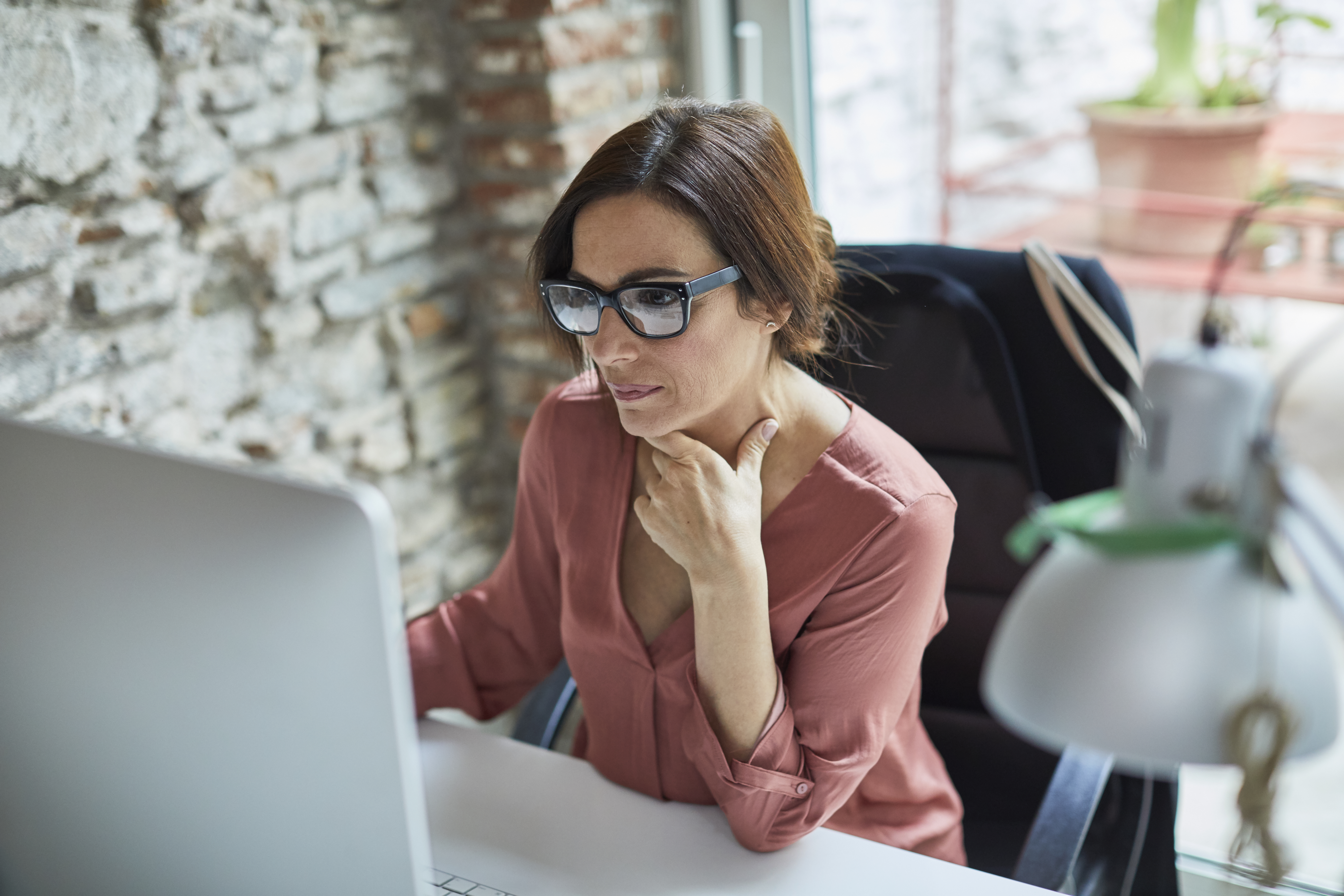 Woman smiling in business setting