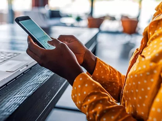 Woman holding a smartphone