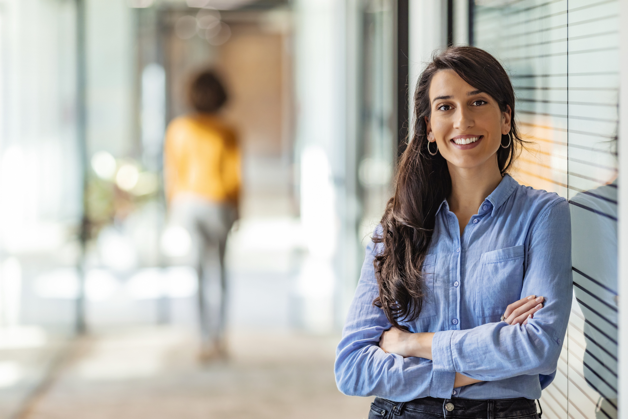 Woman smiling in business setting