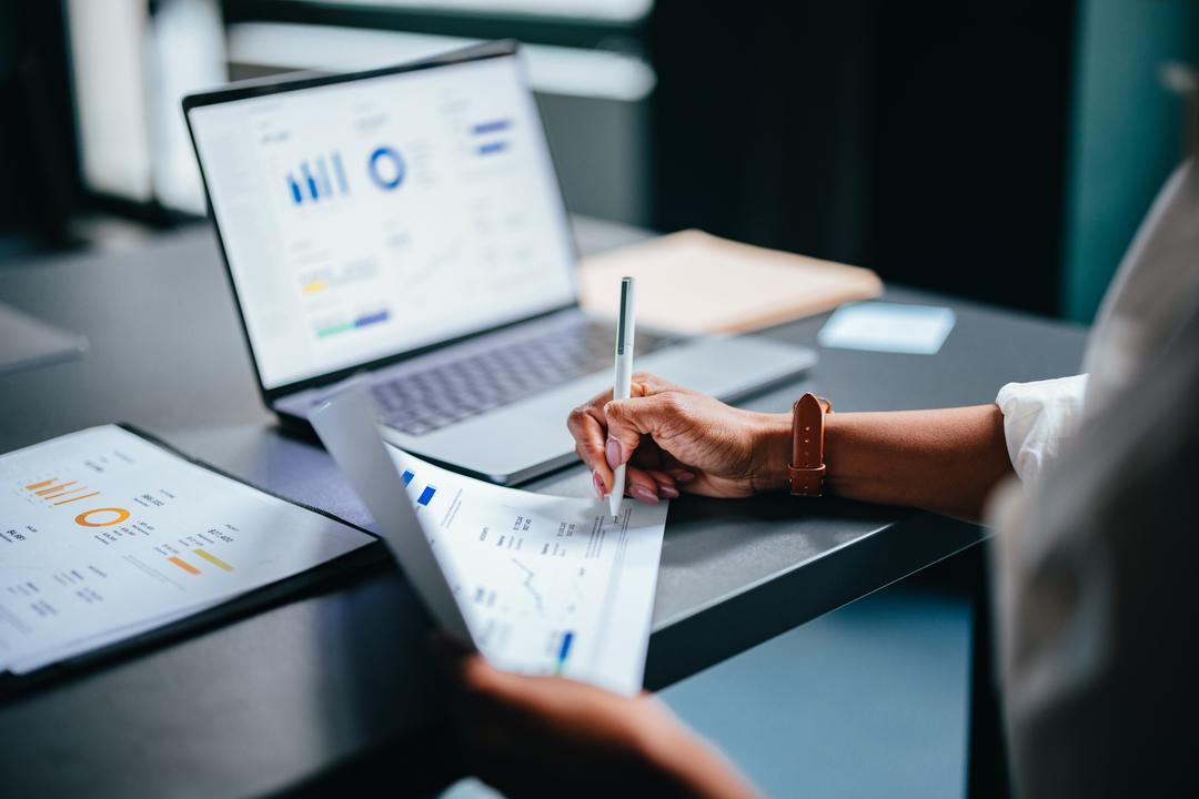 Board member annotating board documents