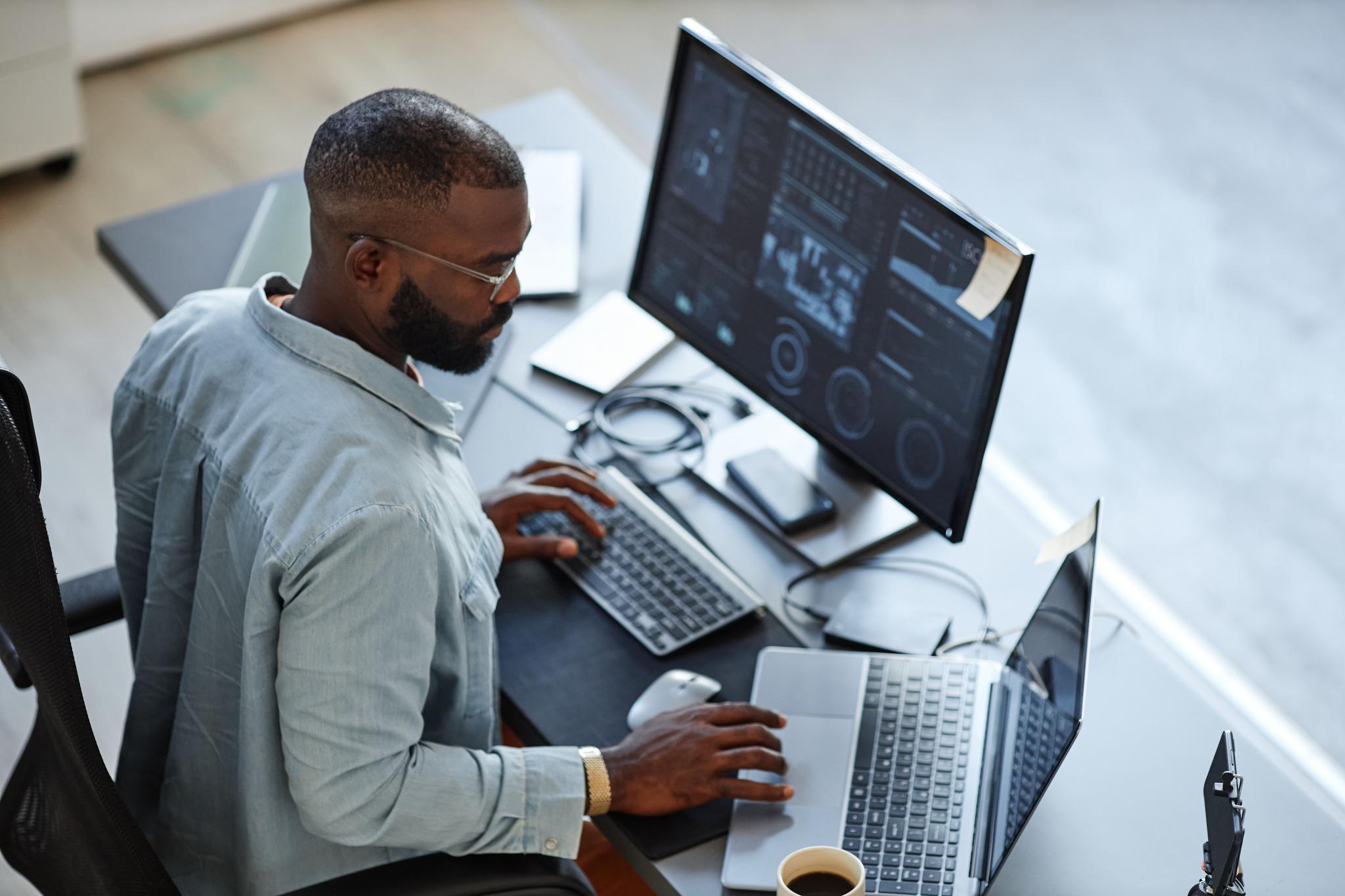 Professional enhancing their cyber risk management