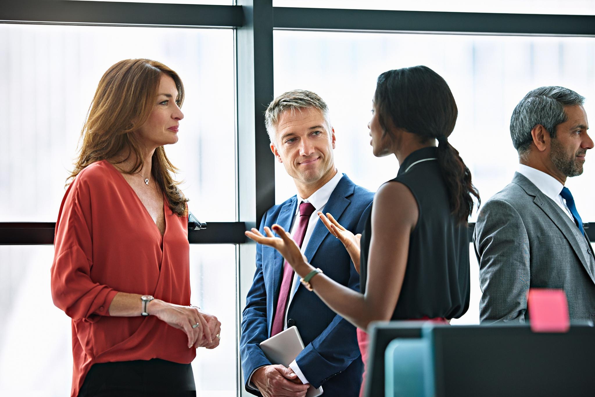 Professionals discussing data-driven decision making