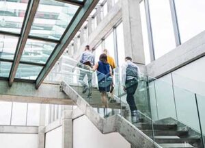 group-colleagues-walking-stairs